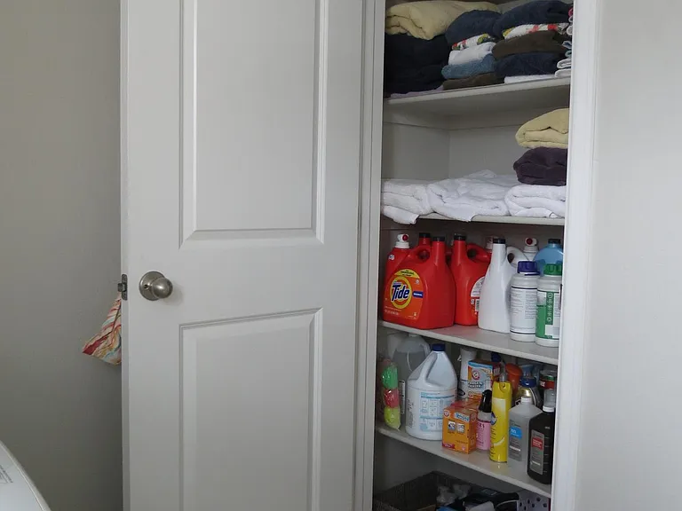 Linen closet with tons of shelves