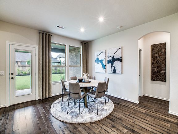 Dining area off kitchen with access to backyard