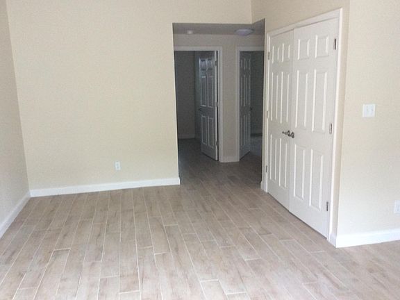Living room, 2 bedrooms in rear