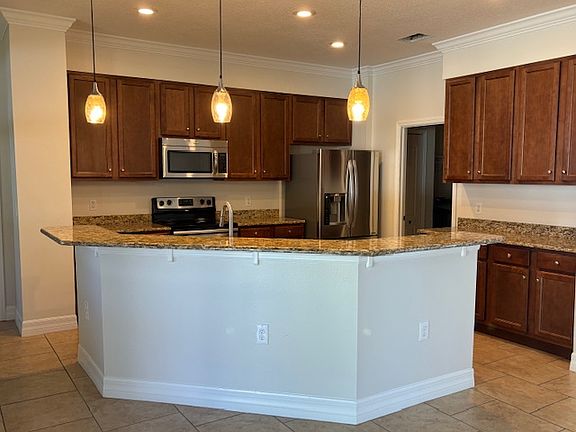 Kitchen with stainless steel appliances