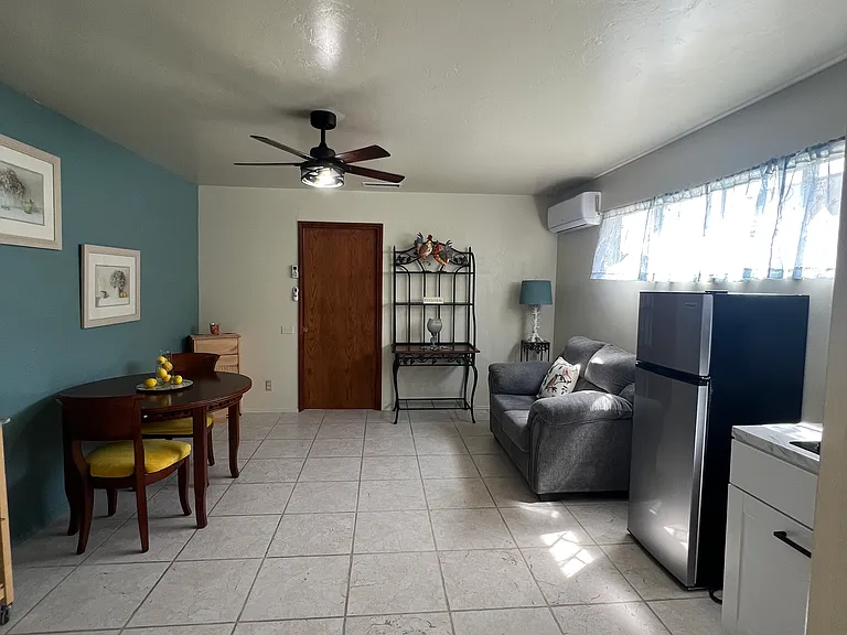 Living area and kitchenette from bathroom doorway