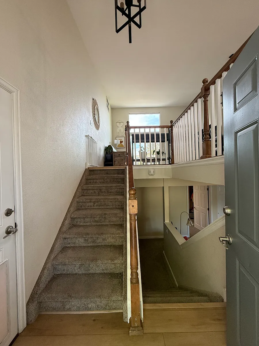 Entry - split level home. Each level has two bedrooms, a bathroom, and a living room. Kitchen is on the upper level. Laundry is on the lower level. - 5903 S Taft St