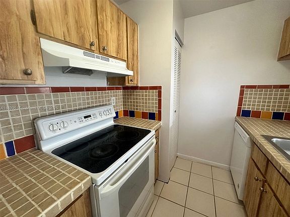 4th image of 9808 Hammocks Blvd APT 204-23