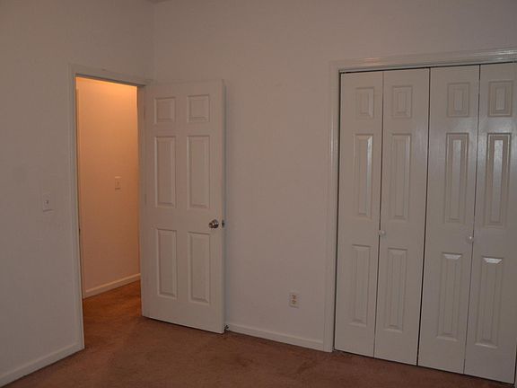 Bedroom flooring has been updated to laminate