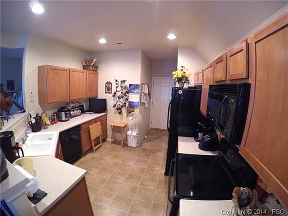 Open concept kitchen with matching appliances