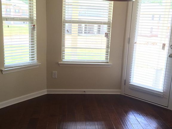 Breakfast area with hardwood floor