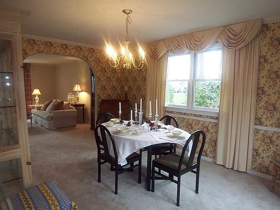 Dining Room with Custom-made Double Pella doors to Deck and Gazebo