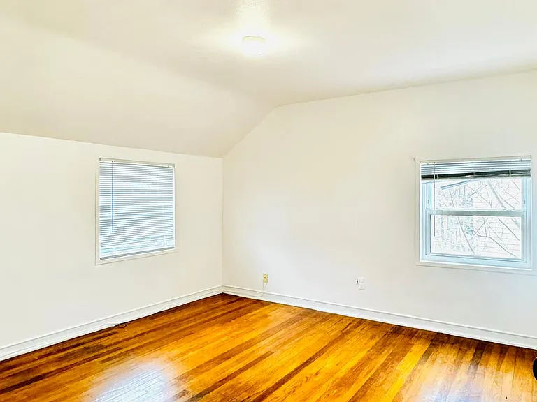 Main bedroom with two closets (not shown in the image)