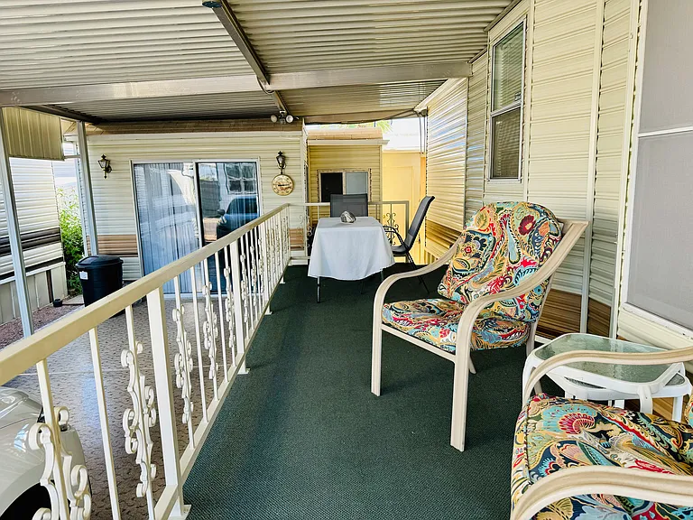 Nice large porch. Shed directly behind, casita on the left.