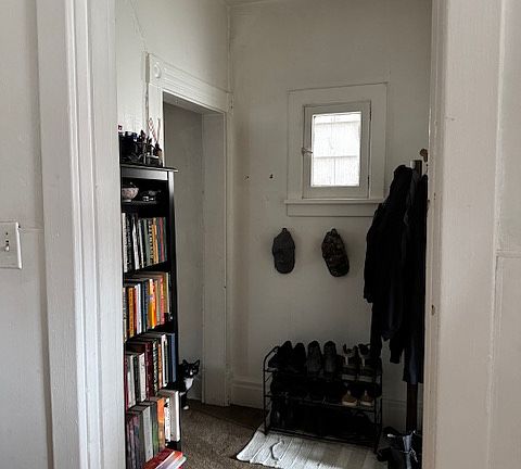 Entry area inside apartment's 2nd floor door from building common area
