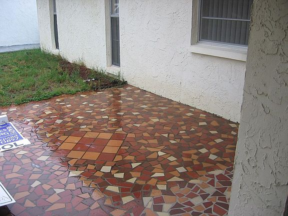 Paved verandah front of home