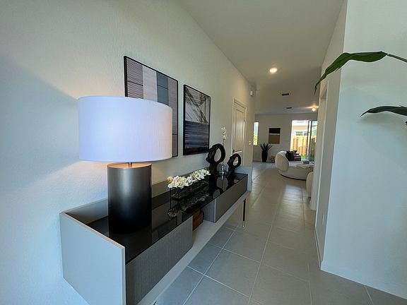 Property Entrance (The property does not come Furnished, It was professionally staged for the pictures)