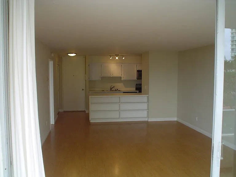 view from terrace of kitchen area and front door