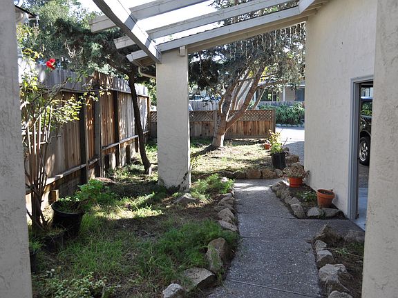 Looking out the front door. Door to garage on the right side.