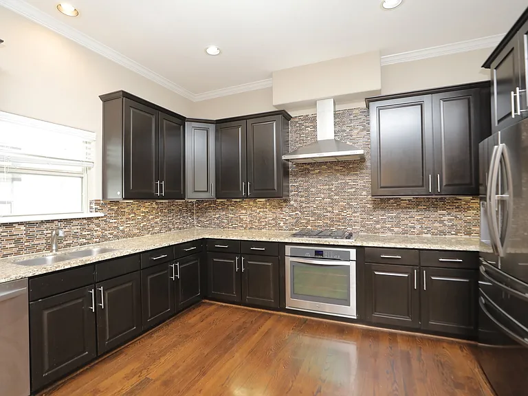 Gas cooktop with beautiful vent.