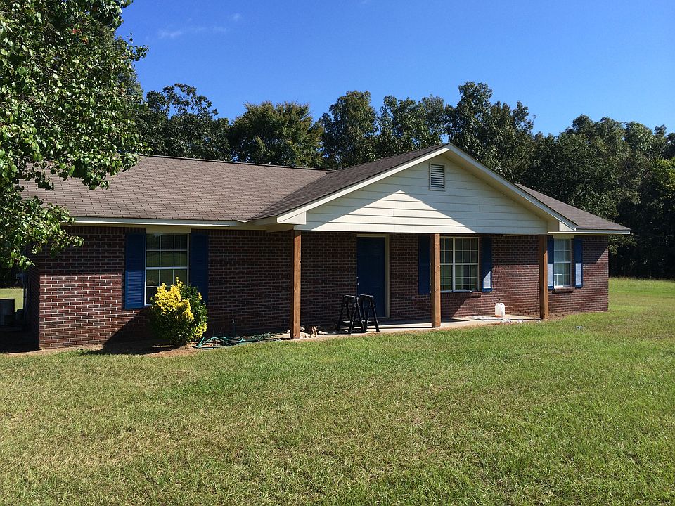 Front view: home is 900 feet off road on 5 acres