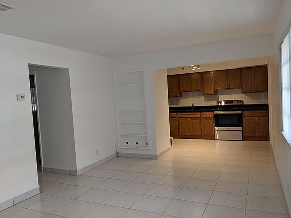 Brand new kitchen cabinets and brand new appliances, build in bookshelves, LED lights