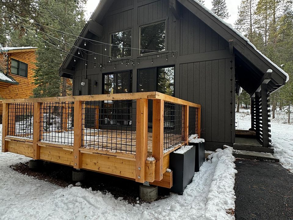 Front entry to house with deck off living/dining room