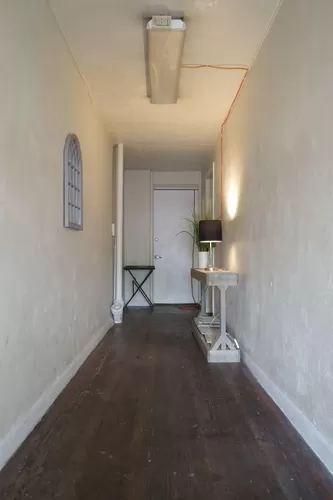 This is the downstair Hallway from the out door going inside to the Unit door on the right - 4889 S State St