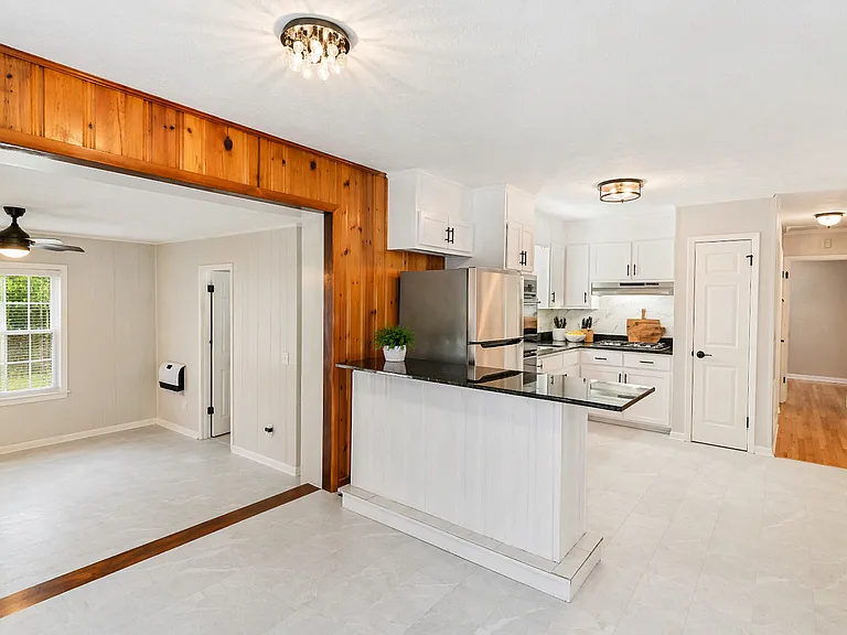 Spacious open-concept layout with the kitchen overlooking the formal dining area_perfect for everyday living and entertaining.