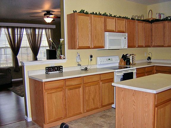Large Kitchen with Center Island Opens to Living Room 