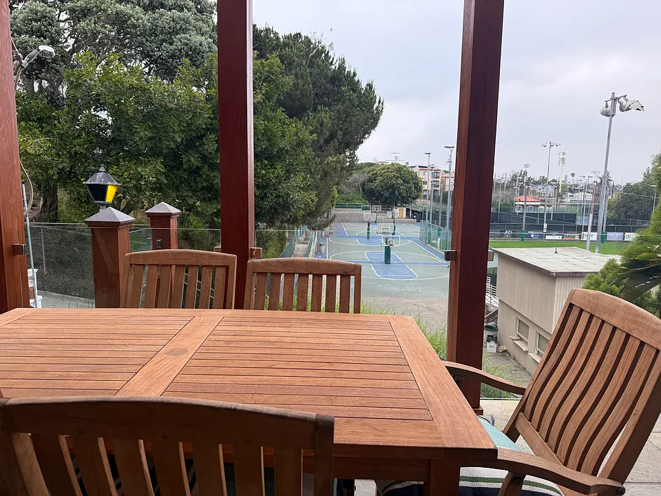 Overlooking Live Oak Park. Sip a glass of wine while the kids shoot hoops