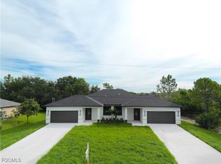 2404/2406 Dickens Ave N, Lehigh Acres, FL 33971