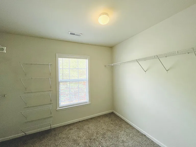 Closet of primary bedroom 1