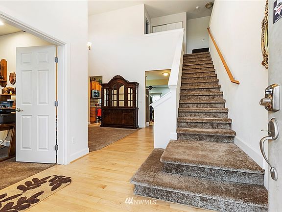 High Soaring Ceilings with plenty of light invite you into this beautiful 3 bedroom 2.5 bath home