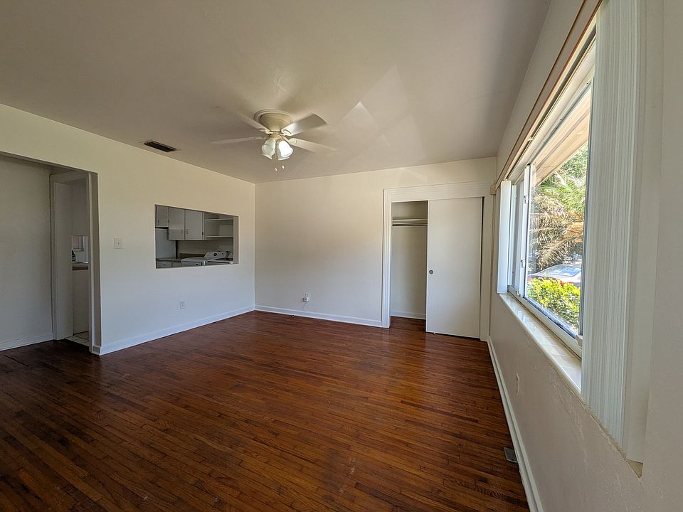 The living room is to your right when you enter the apartment. It has a large storage closet