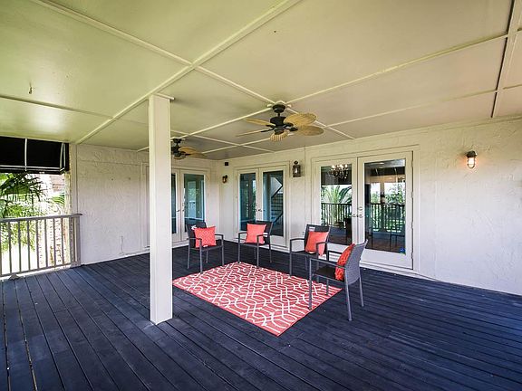 Outdoor living space abounds in this home, with 2 covered patios, to enjoy your waterfront views.