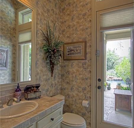 Pool off kitchen/hallway opens to the pool area in back.