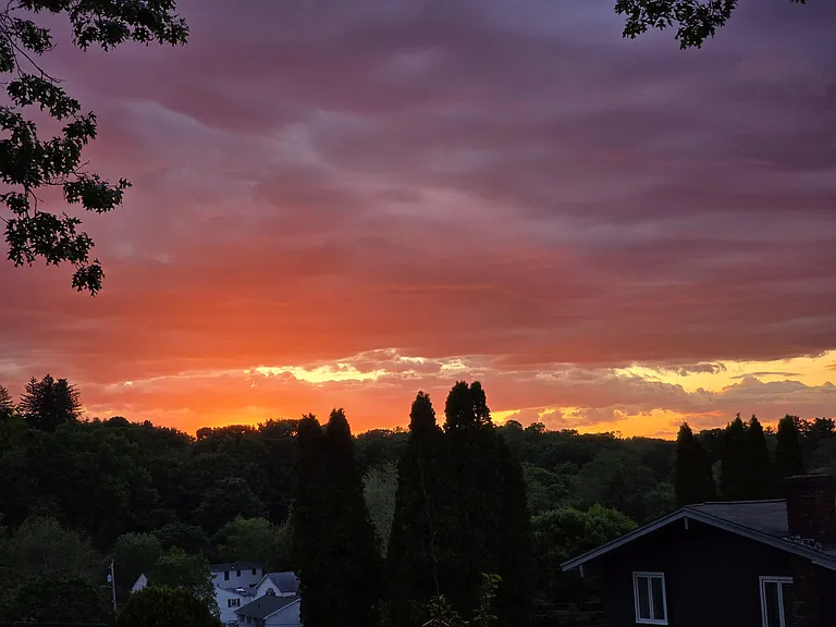 Enjoy beautiful sunsets from the stone covered firepit area.
