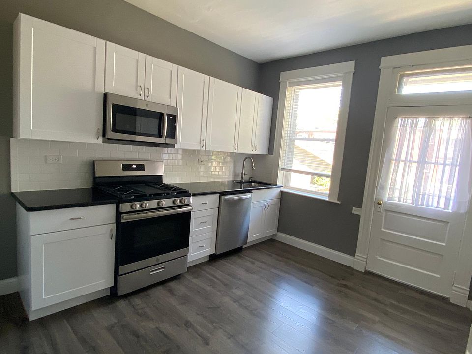 Kitchen with new stainless steel appliances
