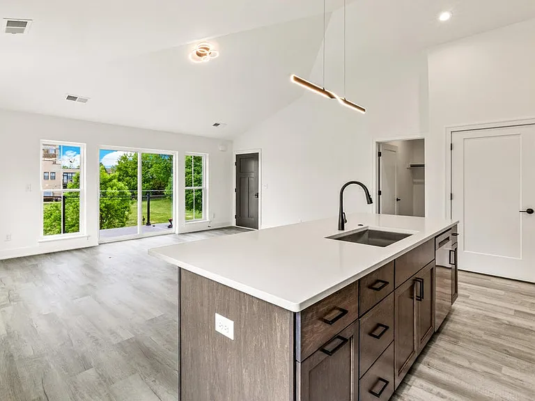 Vaulted Ceilings & Modern Light Fixtures