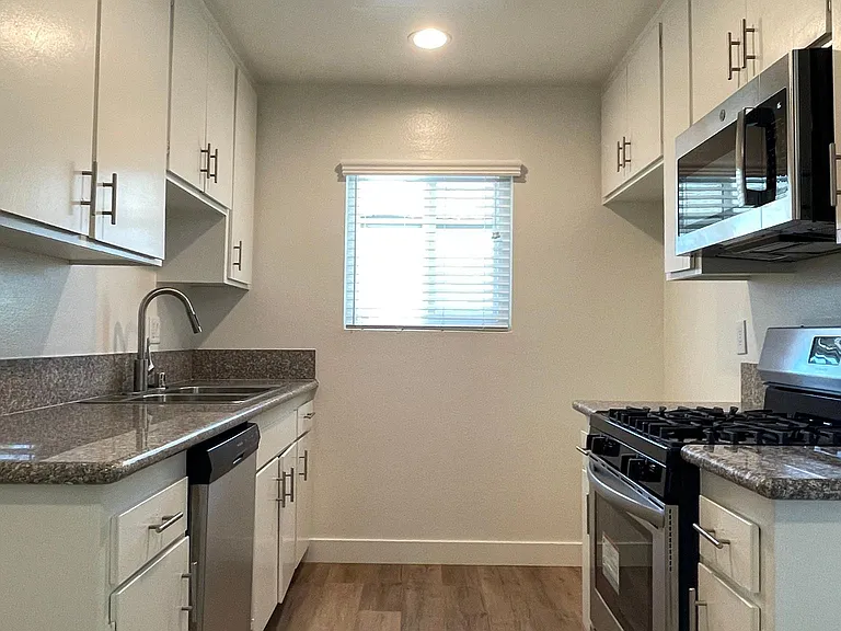 2bed+1.5bath Split Level Kitchen with granite countertops, recessed lighting, and new microwave.
--
*Floor plans are digital renderings. All dimensions are approximate. Actual product and specifications may vary in dimension or detail. Not all features ar