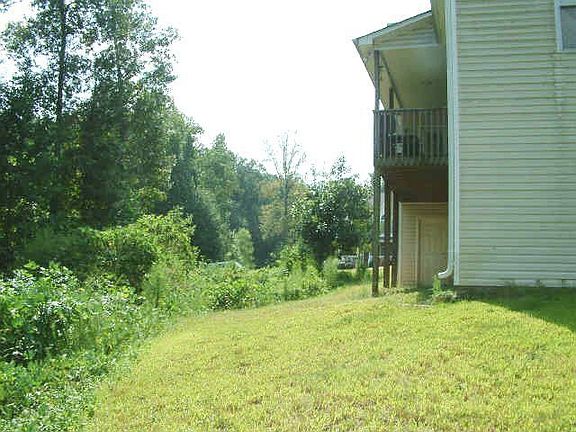 Very private side yard to right