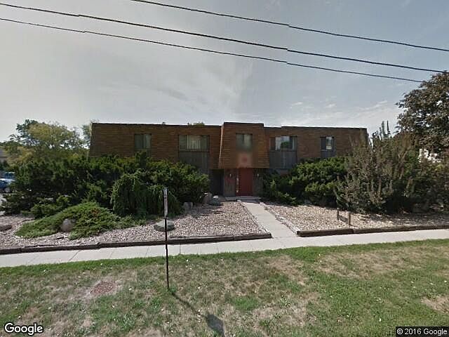 Front view of 7 plex apt building.