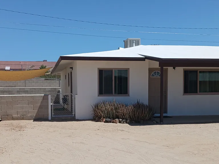 Duplex with attached garage & shade covered patio
