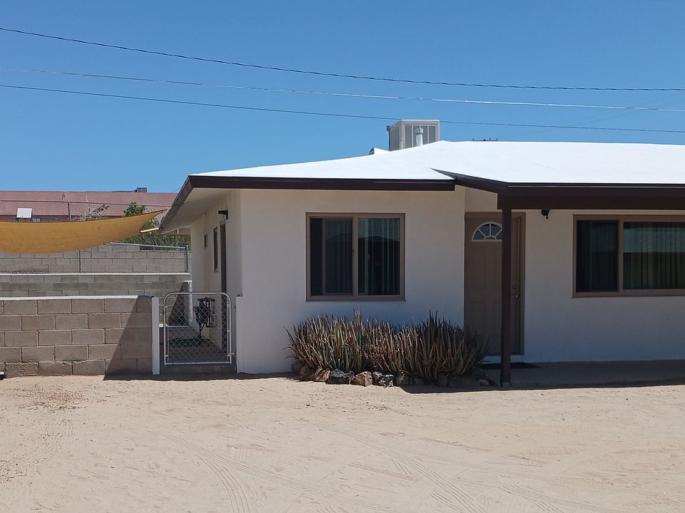 Duplex with attached garage & shade covered patio