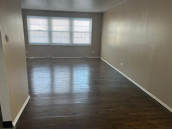 Living room Dining room combo with refinished floors