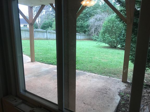 patio and fenced back yard