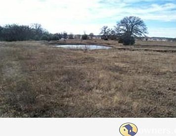 SOUTH VIEW FROM CENTER OF PROPERTY