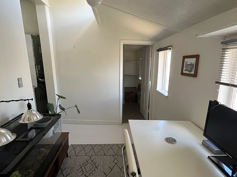 Office area leads to bathroom