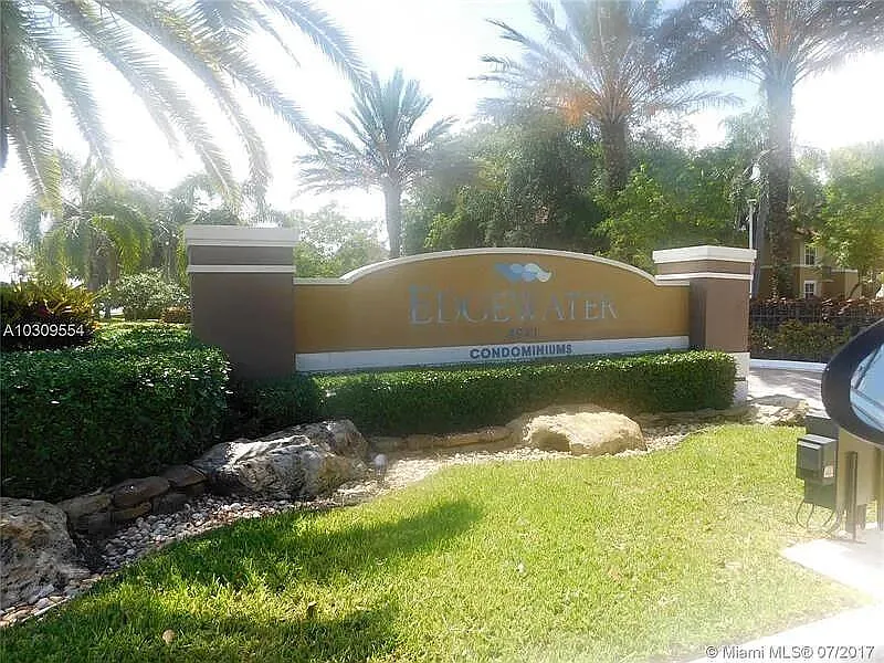 Building Photo - 8781 Wiles Rd #203