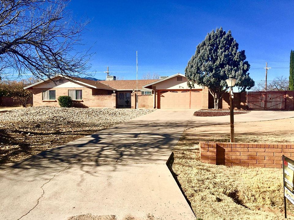 Two car garage, paved carport can fit over five vehicles