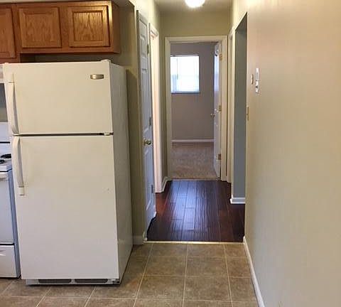 Hallway to bedrooms and bath 