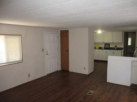 Living and partial view of Kitchen