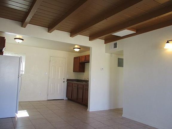 living room, from front pool area, back door to yard