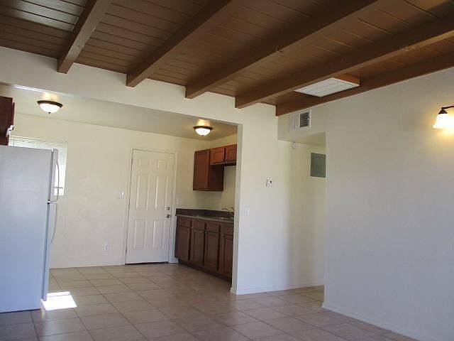 living room, from front pool area, back door to yard